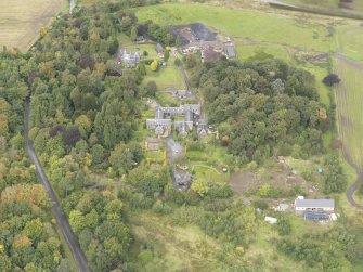 General oblique aerial view of Gowanbank steading with adjacent farmhouse and dairy, looking to the N.