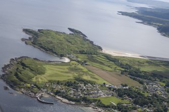 Oblique aerial view of Carradale Golf Course and Carradale Pier, looking S.