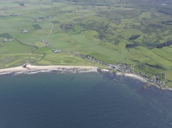 Oblique aerial view of Machrihanish Golf Course and Machrihanish village, looking SSE.