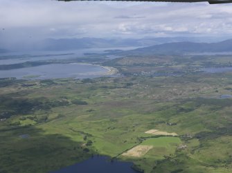 General oblique aerial view of Connel airfield with Loch Linnhe beyond, looking N.