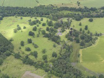 Oblique aerial view of Ochtertyre House and policies, looking NNE.