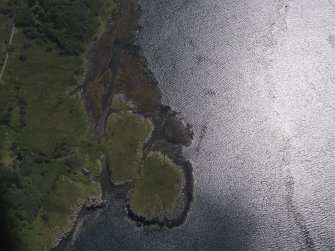 Oblique aerial view of the boathouse and jetty, looking SSE.