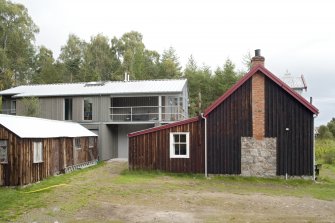 General view from west with workshop and new house