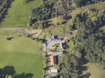 Oblique aerial view of Colliechat Castle, taken from the E.