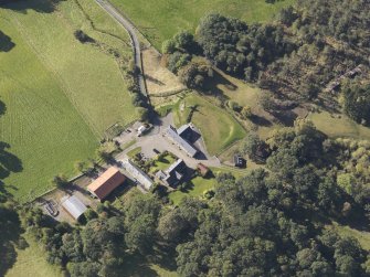 Oblique aerial view of Colliechat Castle, taken from the NE.