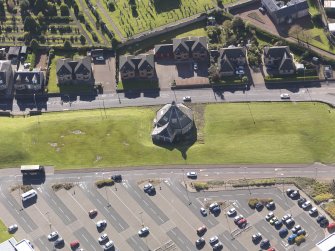Oblique aerial view of the former Liverstock Market Auction Room Lanark, taken from the NE.
