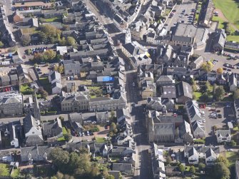 General oblique aerial view of Lanark High Street centred on St Nicholas Church, taken from the WNW.