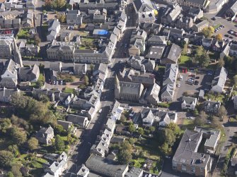 General oblique aerial view of Lanark High Street centred on St Nicholas Church, taken from the W.