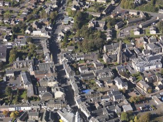 General oblique aerial view of Lanark High Street centred on St Nicholas Church, taken from the SE.