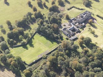 Oblique aerial view of Carstairs House, taken from the NE.