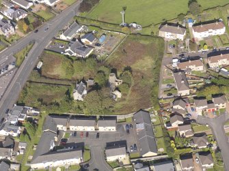 Oblique aerial view of High Mill Windmill Carluke, taken from the SSW.