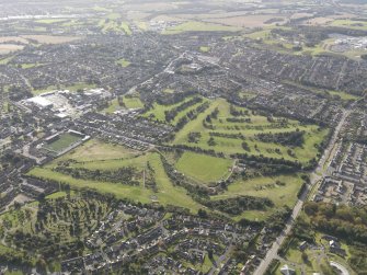 Oblique aerial view of Falkirk Tryst Golf Course, taken from the NE.