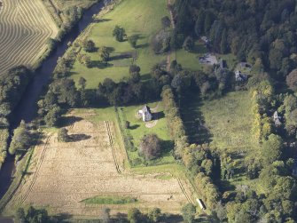 Oblique aerial view of Castle Newe, taken from the ENE.