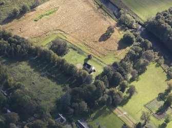 Oblique aerial view of Castle Newe, taken from the NW.