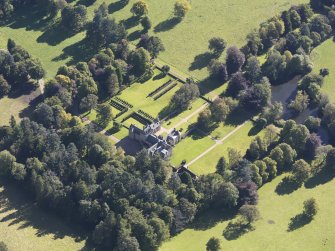 Oblique aerial view of Glenkindie House, taken from the NW.