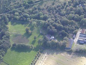 Oblique aerial view of Asloun Castle, taken from the NNW.