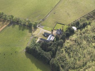 Oblique aerial view of Mains of Hallhead, taken from the NW.
