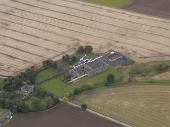 Oblique aerial view of Benvie Farm Buildings, taken from the NNE.