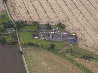 Oblique aerial view of Benvie Farm Buildings, taken from the N.