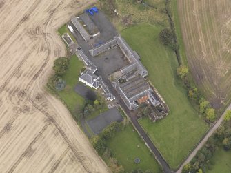 Oblique aerial view of Benvie Farm Buildings, taken from the SE.