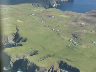 General oblique aerial view of Stonybrek, Fair Isle, looking NE.