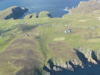 Oblique aerial view of Fair Isle Parish Church and school, Fair Isle, looking NW.