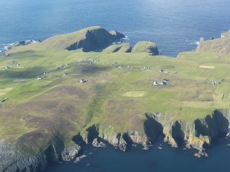 Oblique aerial view of Fair Isle Parish Church and school, Fair Isle, looking NW.