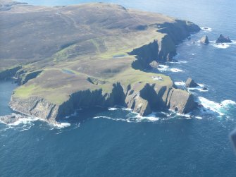 General oblique aerial view of Skroo Lighthouse, Fair Isle, looking SW.