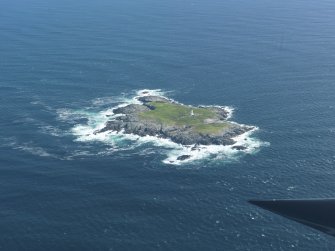 General oblique aerial view of Sule Skerry lighthouse, taken from the WNW.