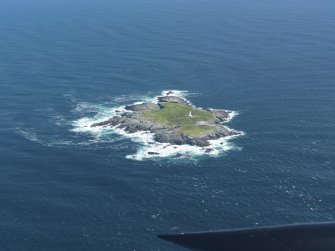 General oblique aerial view of Sule Skerry lighthouse, taken from the WSW.