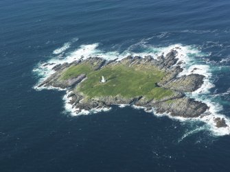 Oblique aerial view of Sule Skerry lighthouse, taken from the SE.