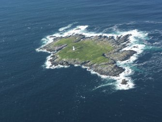 Oblique aerial view of Sule Skerry lighthouse, taken from the E.