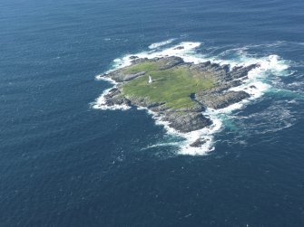 Oblique aerial view of Sule Skerry lighthouse, taken from the ENE.