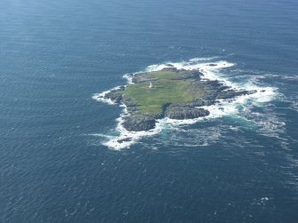 Oblique aerial view of Sule Skerry lighthouse, taken from the NE.