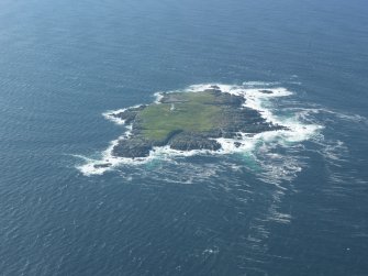 Oblique aerial view of Sule Skerry lighthouse, taken from the NNE.