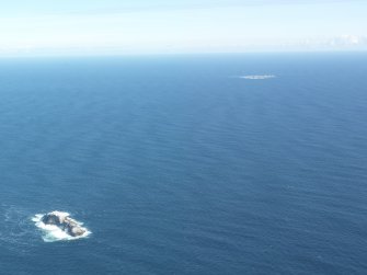 General oblique aerial view of Sule Stack with Sule Skerry in the distance, taken from the SSW.