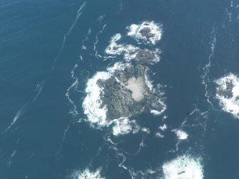 Oblique aerial view of The Skerries, looking SE.