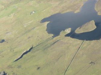Oblique aerial view of Priesthoulland, Loch of Houlland, looking NE.