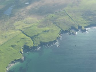 General oblique aerial view of Kirkhouse, Fetlar, looking SW.