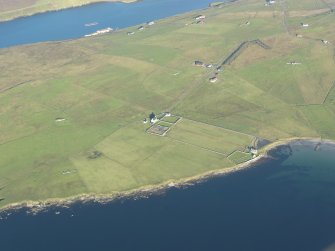 General oblique aerial view of St Marys Chapel and Haa of Sand, looking NW.