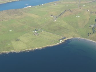 General oblique aerial view of St Marys Chapel and Haa of Sand, looking NW.