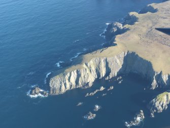 Oblique aerial view of Mu Ness, looking N.