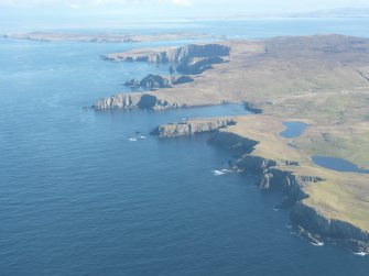 General oblique aerial view of Mu Ness, looking NNE.