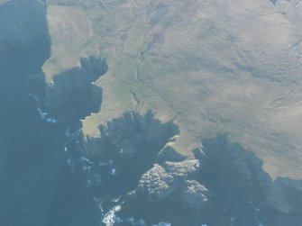 Oblique aerial view of Mu Ness, looking E.