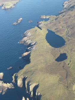Oblique aerial view of Broch of Culswick, looking N.