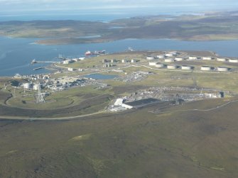 General oblique aerial view of Sullom Voe Oil Terminal, looking SW.