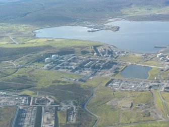 General oblique aerial view of Sullom Voe Oil Terminal, looking SE.