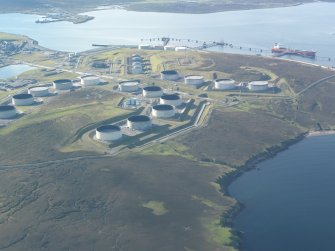 General oblique aerial view of Sullom Voe Oil Terminal, looking SE.