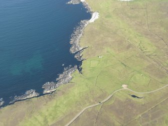 Oblique aerial view of Whalsay Golf Course, looking NNE.