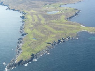 Oblique aerial view of Whalsay Golf Course with Skaw beyond, looking SW.